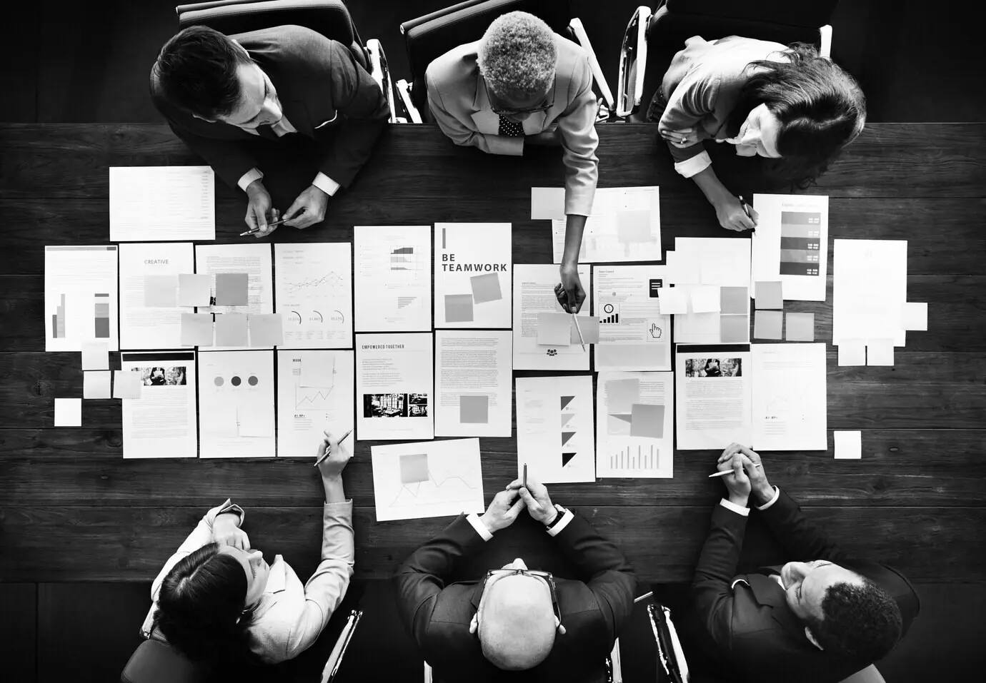 Financial concept of business people analyzing statistics.